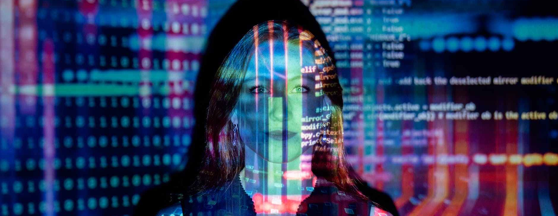 code projected over woman